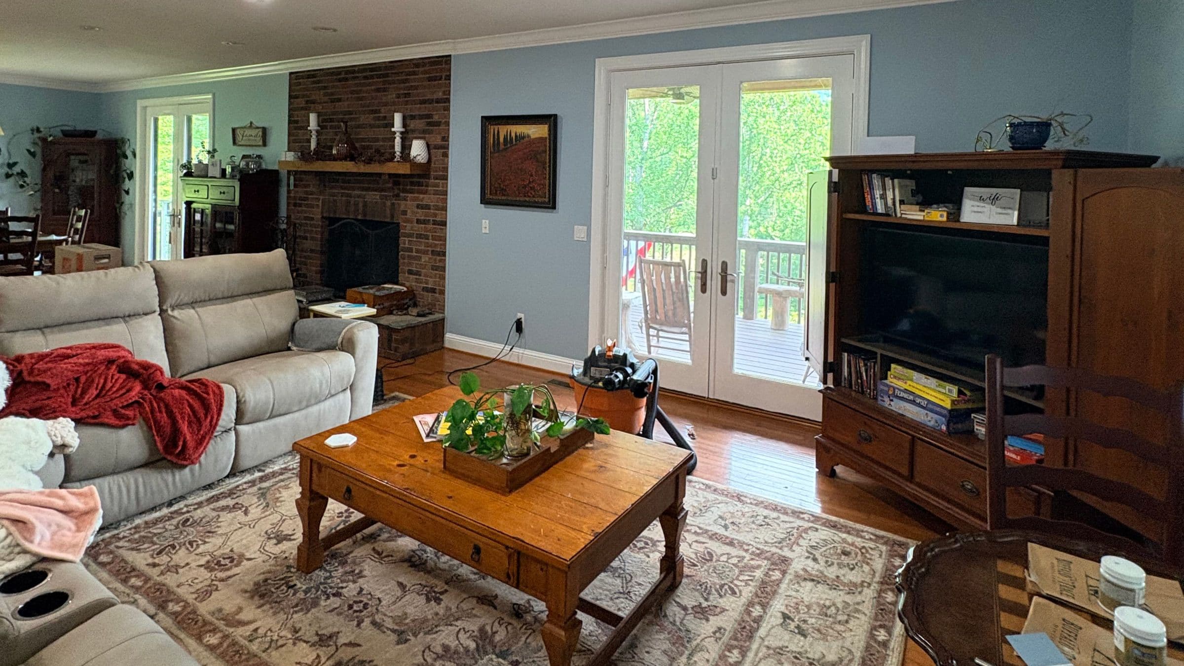 Kitchen and living area with freshly painted walls and trim by TJ Pro Painting in Franklin, NC
